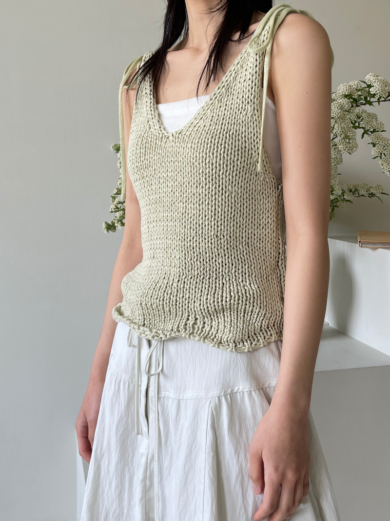 a mini-knit sleeveless shirt